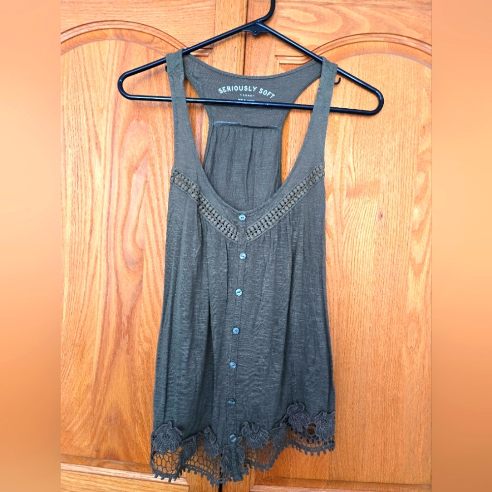 Green tank top, lace lined bottom. Size medium